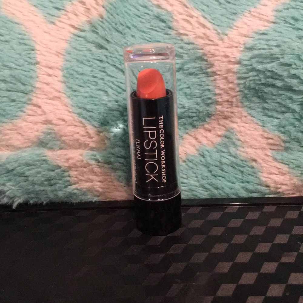 Peach colored lipstick